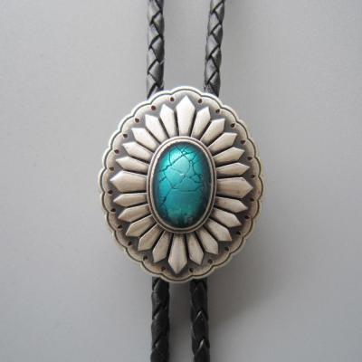 Bolotie argenté et perle turquoise